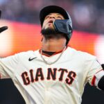 Dodgers outduel Giants in extra innings